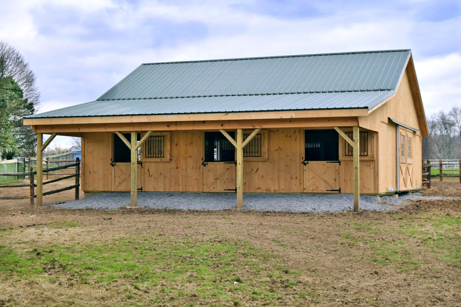 36' x 36' Modular Barn with Metal Roof and 1'' x 10'' T&G Pine Siding.