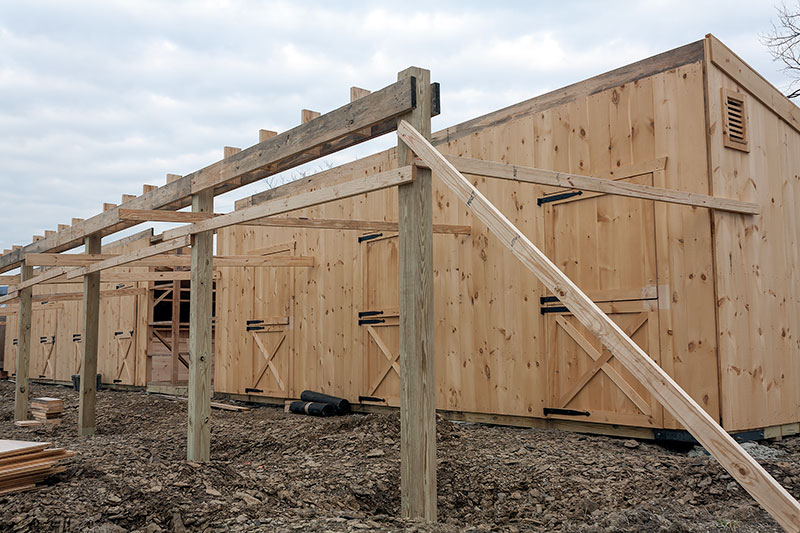 Construction: 12x80 Overhang Being Built on Shed Row Horse Barn