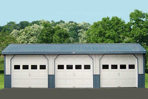 A 3-car garage by Windy Hill Sheds and Barns.