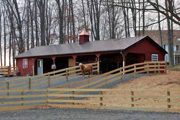  24x60 L-Shaped Modular Horse Barn with Partially Enclosed Overhang - Front View