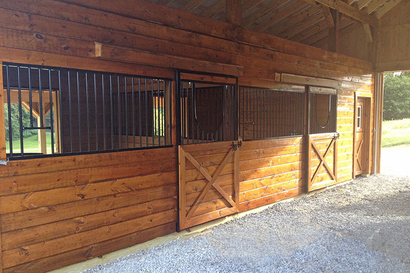 Stall Fronts in 36x36 Modular Horse Barn.  Woodwork is Stained.