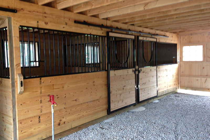 Inside this Modular Horse Barn Showing Stall Fronts.in Raynham, MA