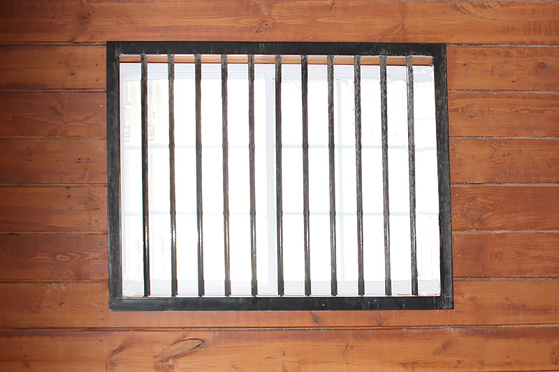 Sample of a Vinyl Stall Window with Guard.