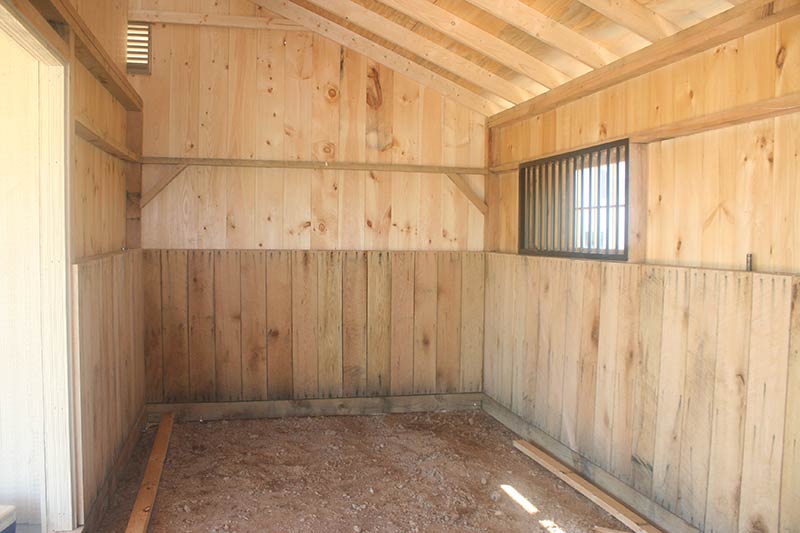 Shed Row Horse Barn Inside Stall with Oak Kick Board
